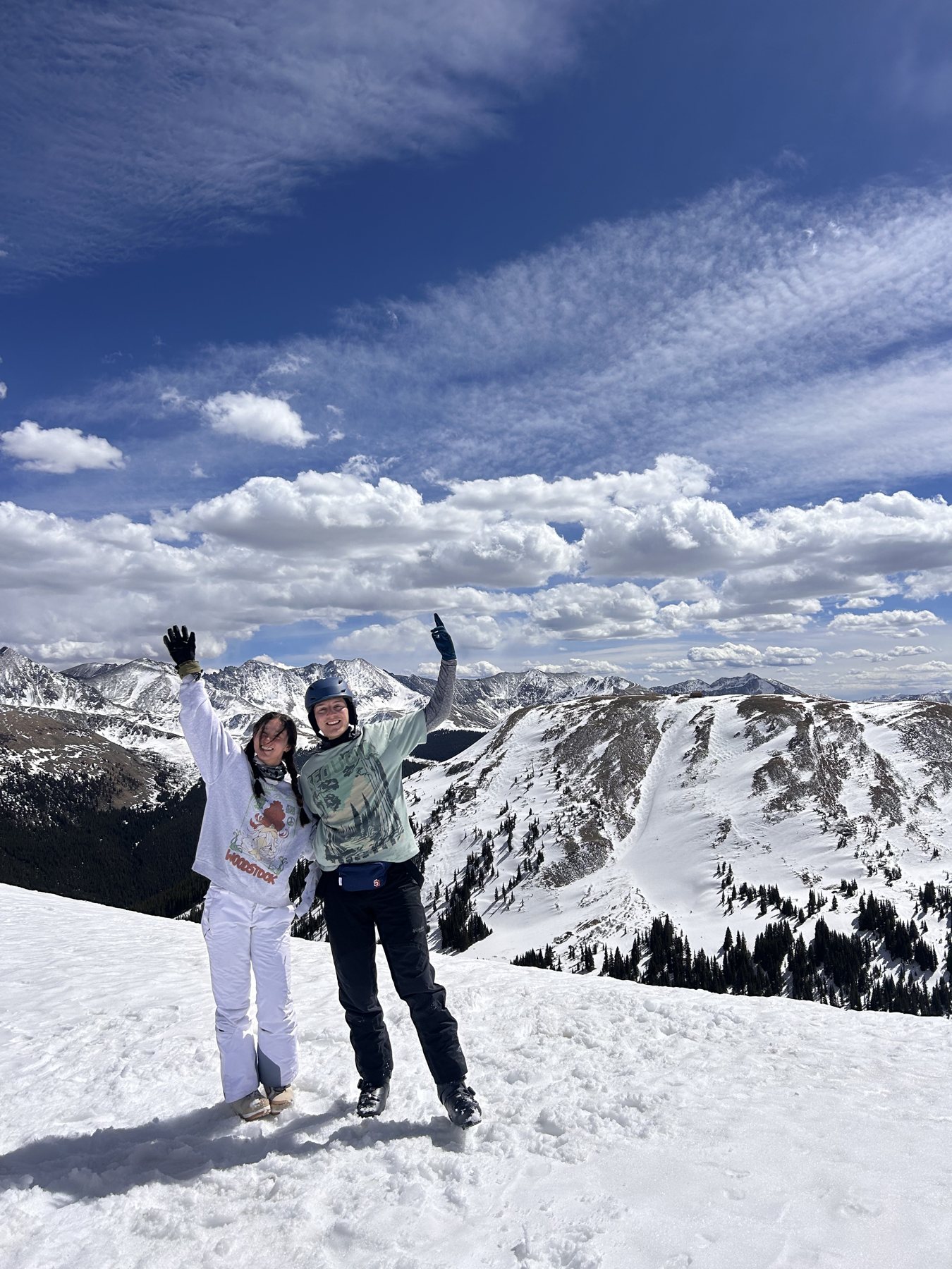 Celebrating at the top of a ski run
